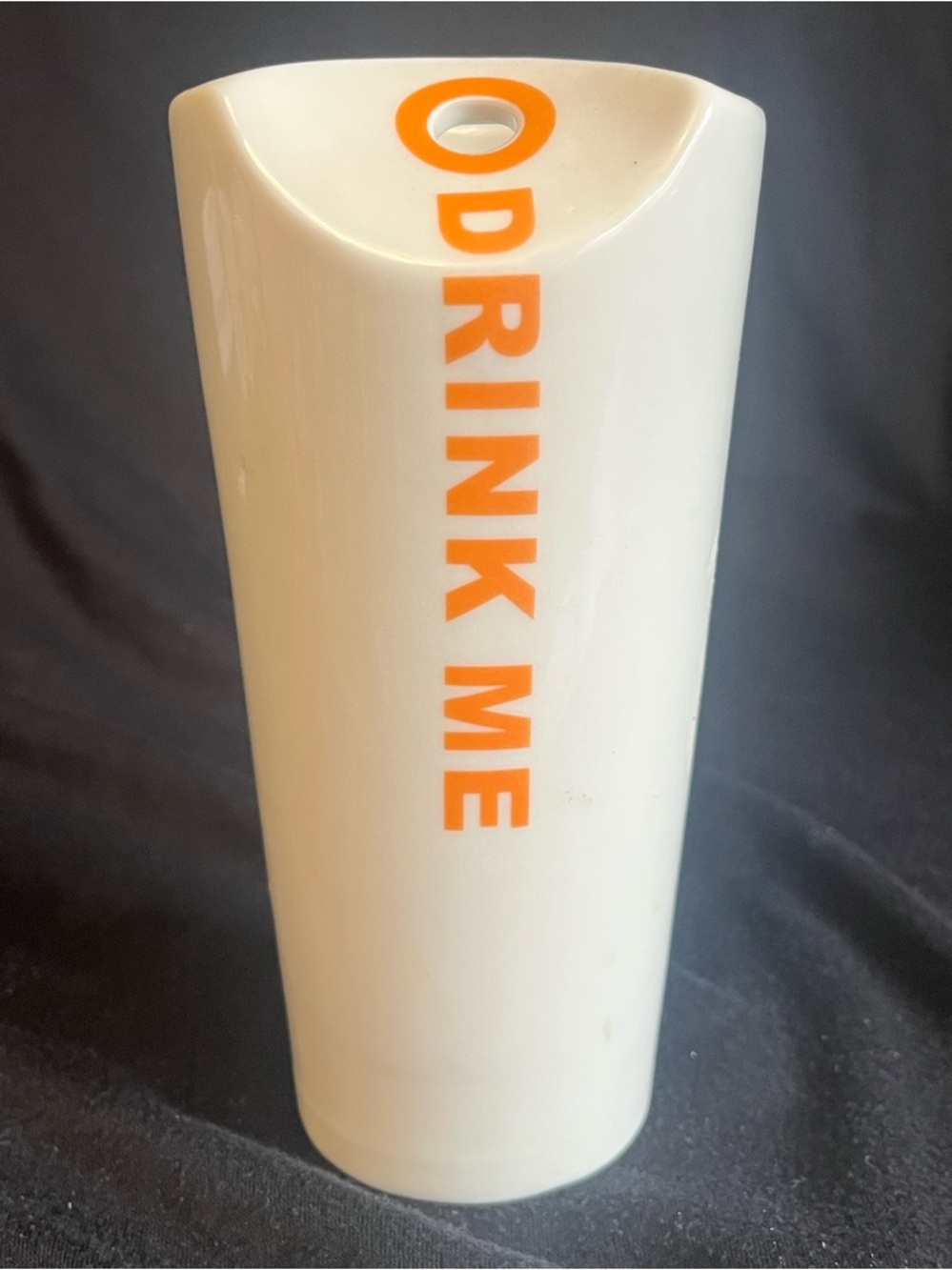 White Ceramic Tumbler with Orange 'DRINK ME' Lettering